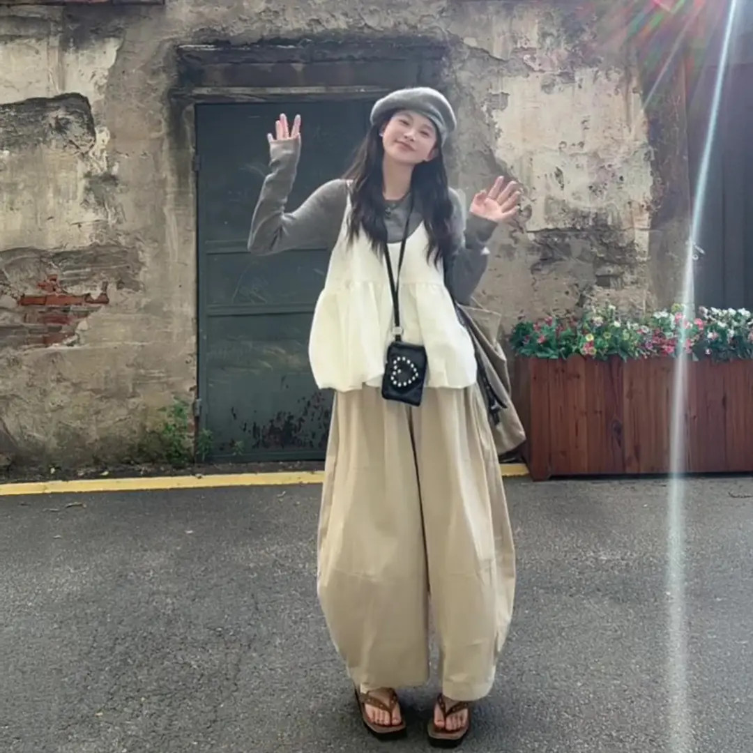 早秋韩系氛围感穿搭女慵懒风长袖针织衫外搭白色吊带阔腿裤三件套
