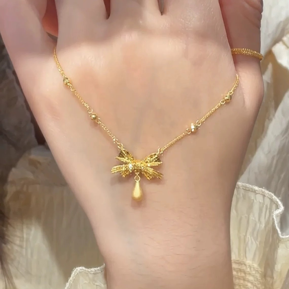 合金吊坠 合金爆闪碎冰冰蝴蝶结水滴女款轻奢百搭锁骨链项链耳钉