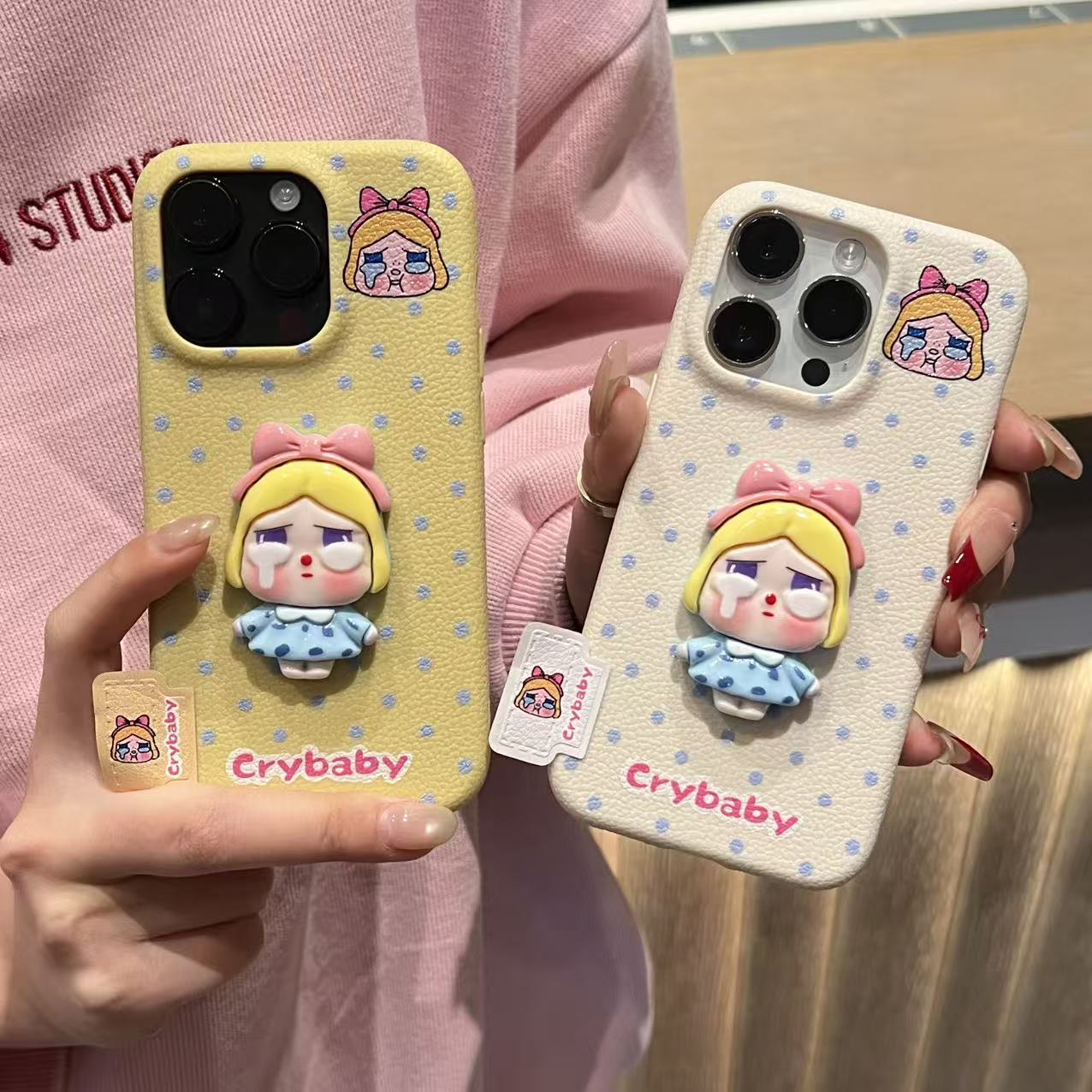 奥菲顿波点哭娃公仔适用苹果17皮纹16手机壳小米15vivo华为oppo套