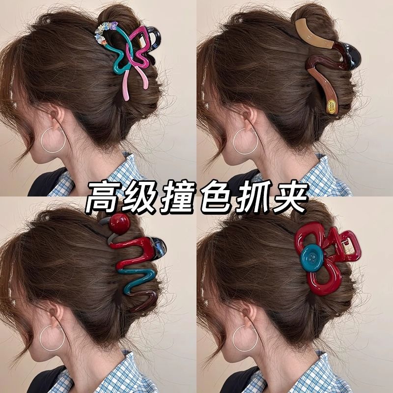 秋冬新品个性撞色蝴蝶结抓夹女高级感精致发夹后脑勺大号盘发鲨鱼