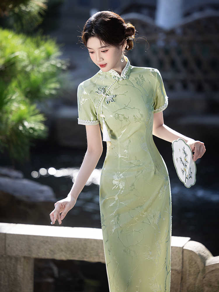 绿色旗袍高端气质少女新中式2025新款夏季提花连衣裙年轻款小个子
