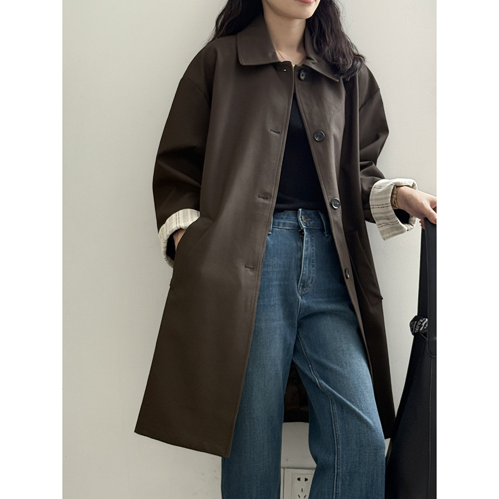 简约竖条拼接卷边袖皮衣女秋季设计感单排扣风衣大衣