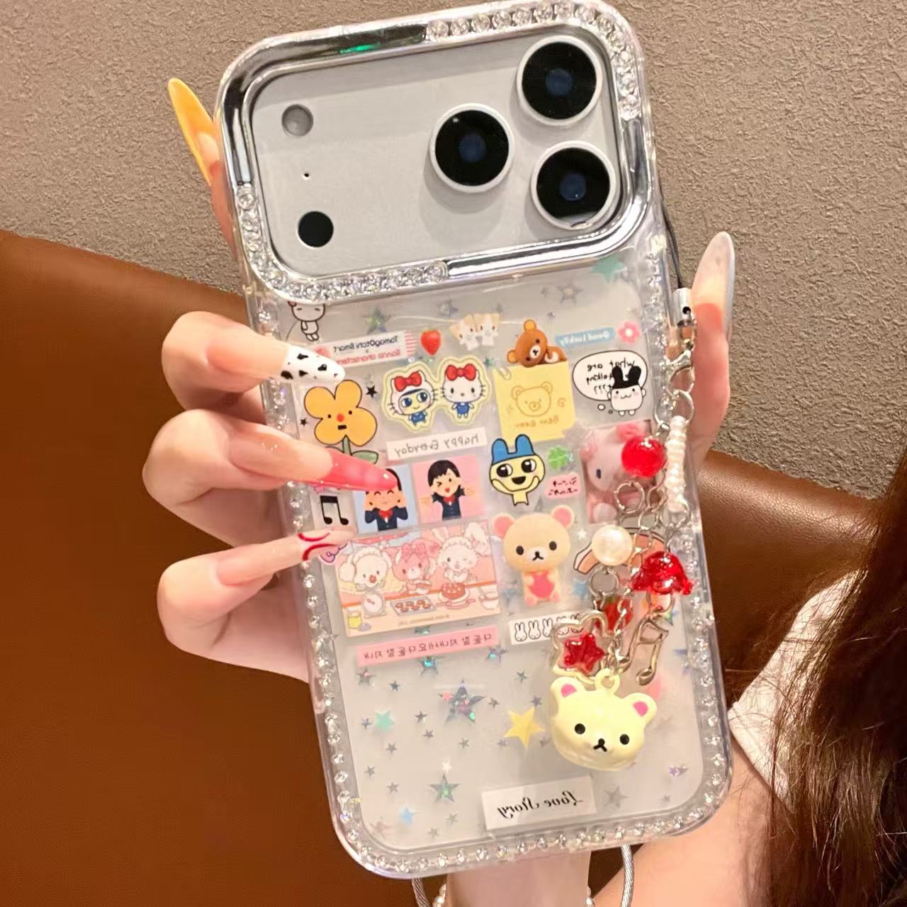 【自带相机保护按键】拓麻歌子手机壳适用于苹果17promax闪钻边框