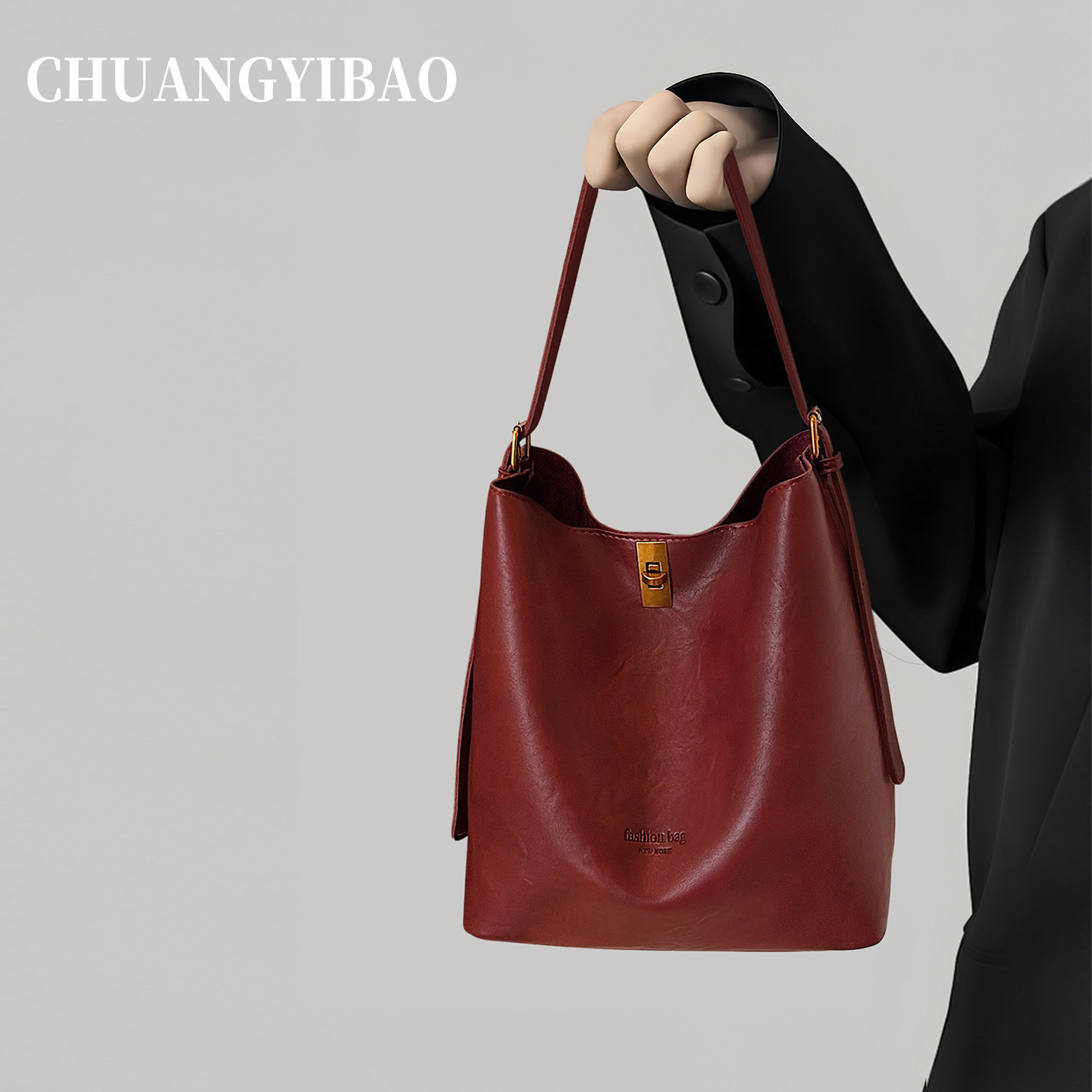 红色秋冬通勤托特包包女2025新款轻奢小众高级感斜挎水桶婚包新娘