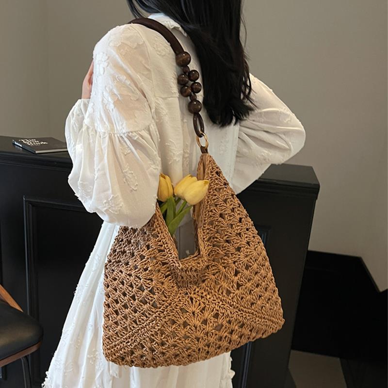 大容量镂空包包女夏天2025新款休闲单肩包手工编织草编海边沙滩包