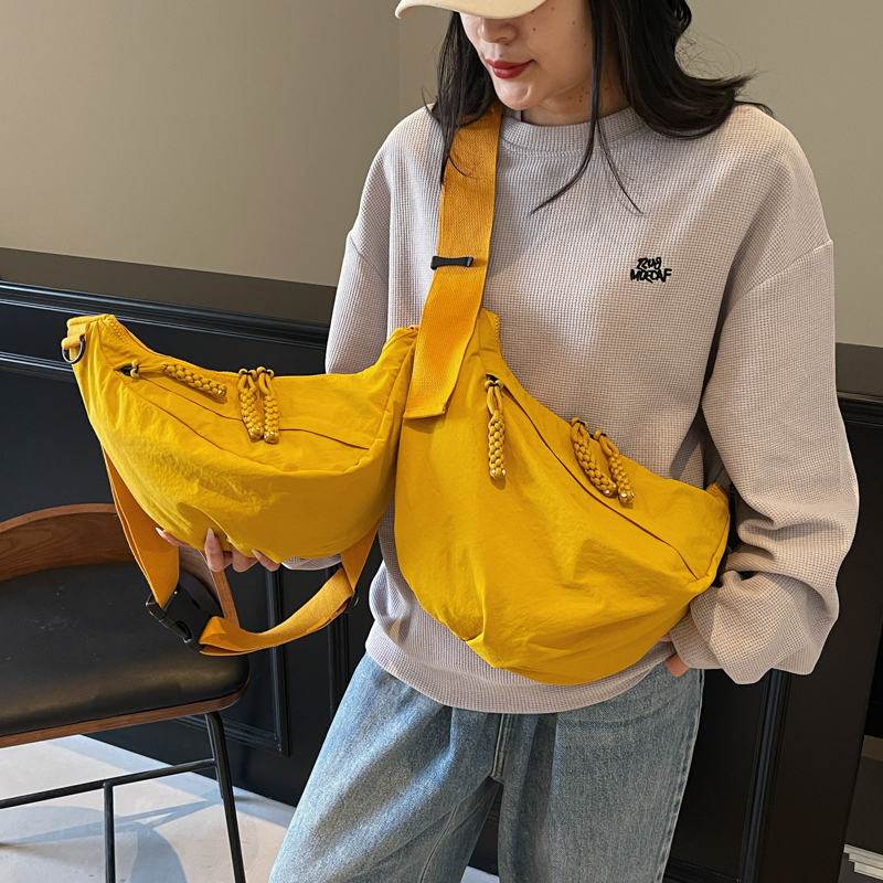 彩色宽带牛津布包包女2025新款夏大容量饺子包休闲运动斜挎包