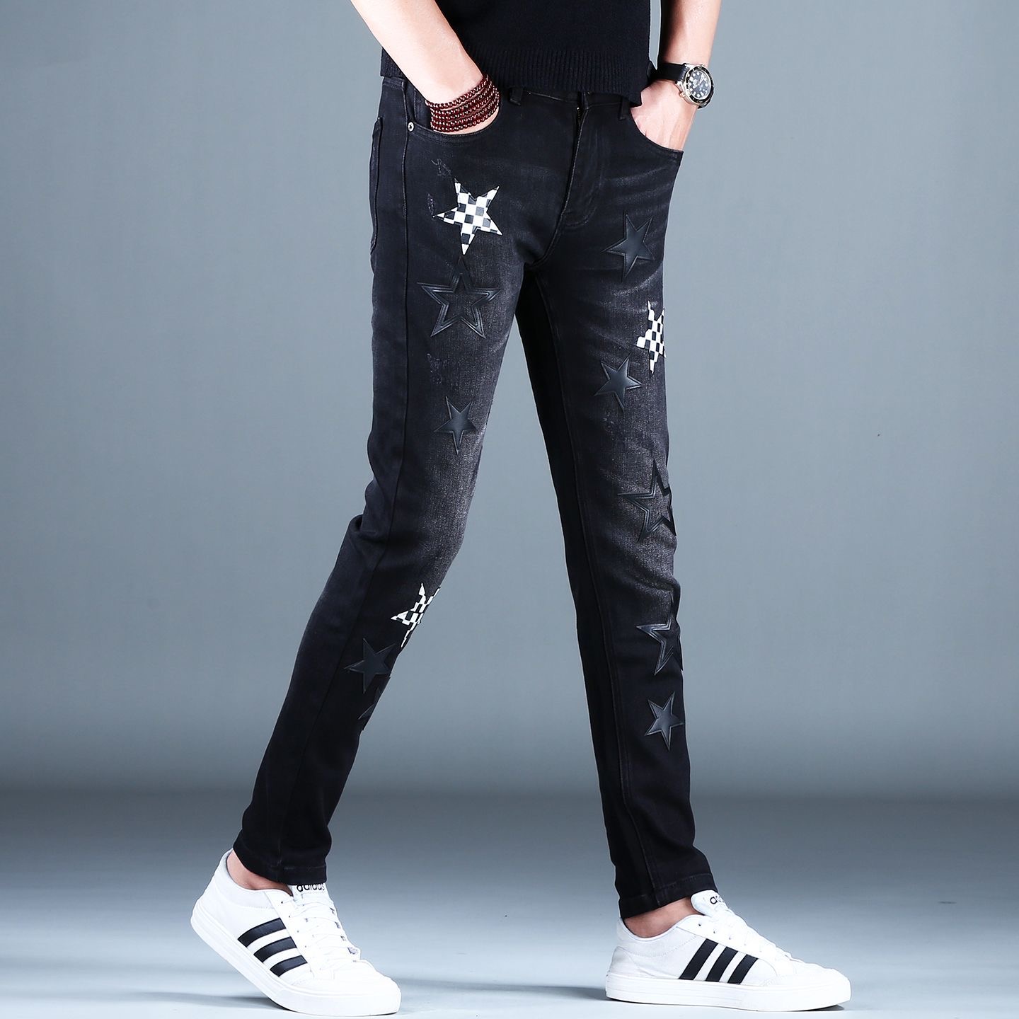 2025年秋冬新款黑色补丁贴皮牛仔裤男弹力修身潮流小脚长裤子韩版