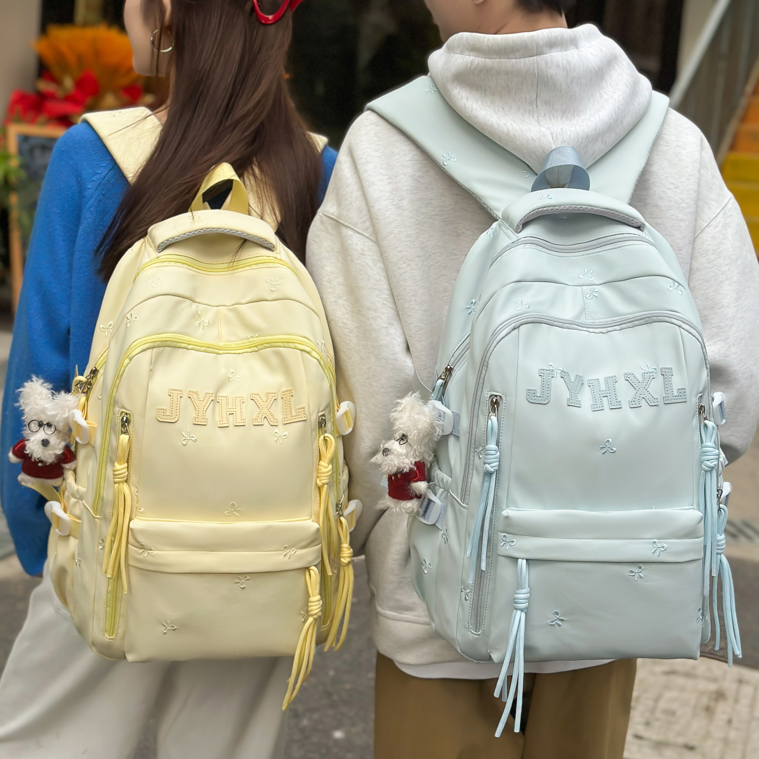 减负护脊书包女韩版小清新字母双肩包森系百搭大容量高中学生背包