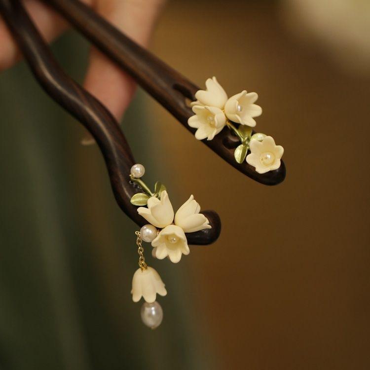 新款黑檀木发簪新中式清冷感国风簪子女高级感铃兰气质盘发簪简约