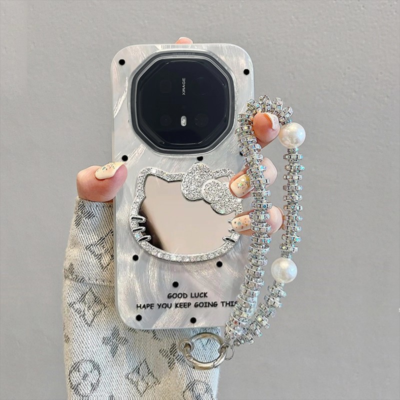 可爱卡通波点kt猫镜子适用华为mate70rs非凡大师手机壳新款女潮牌