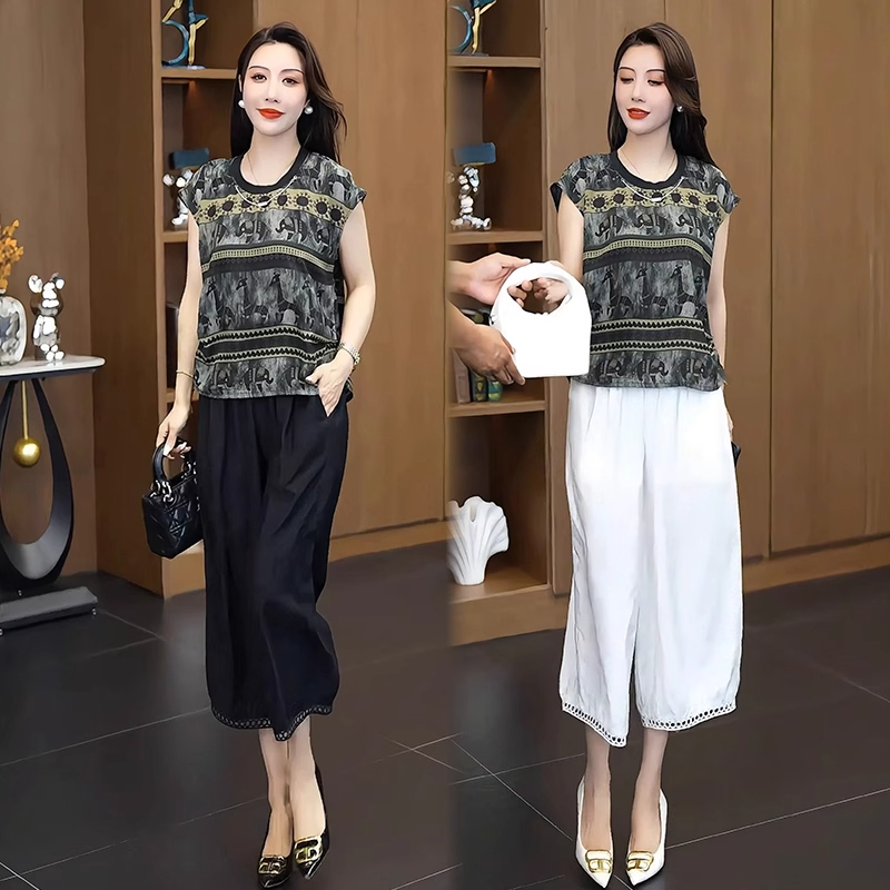 时尚套装女2025夏季新款时髦洋气设计感印花上衣镂空灯笼裤两件套