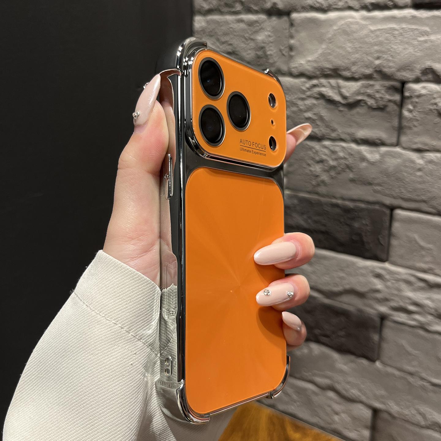 适用于苹果17promax手机壳四角防摔带镜头膜软边拼接星宇橙高级感