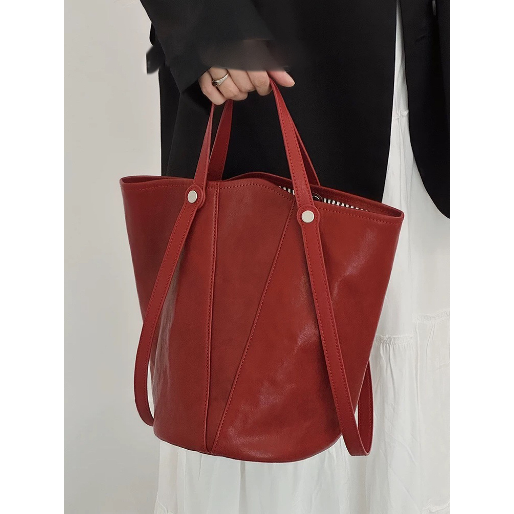 头层植鞣牛皮水桶包包女秋冬新款复古小众单肩斜挎包手提包