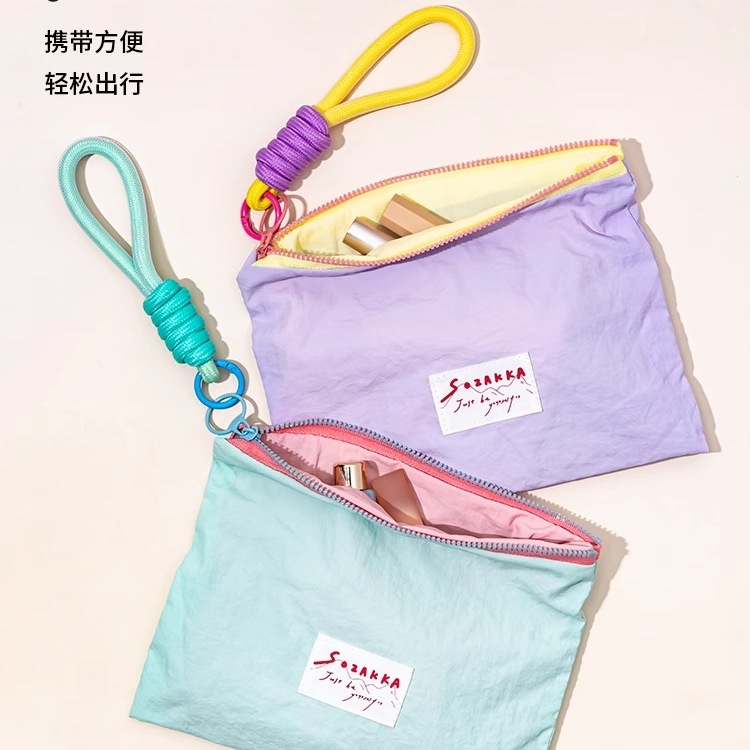 马卡龙收纳外出便携简约小包撞色多巴胺薄款化妆包零钱口红收纳袋