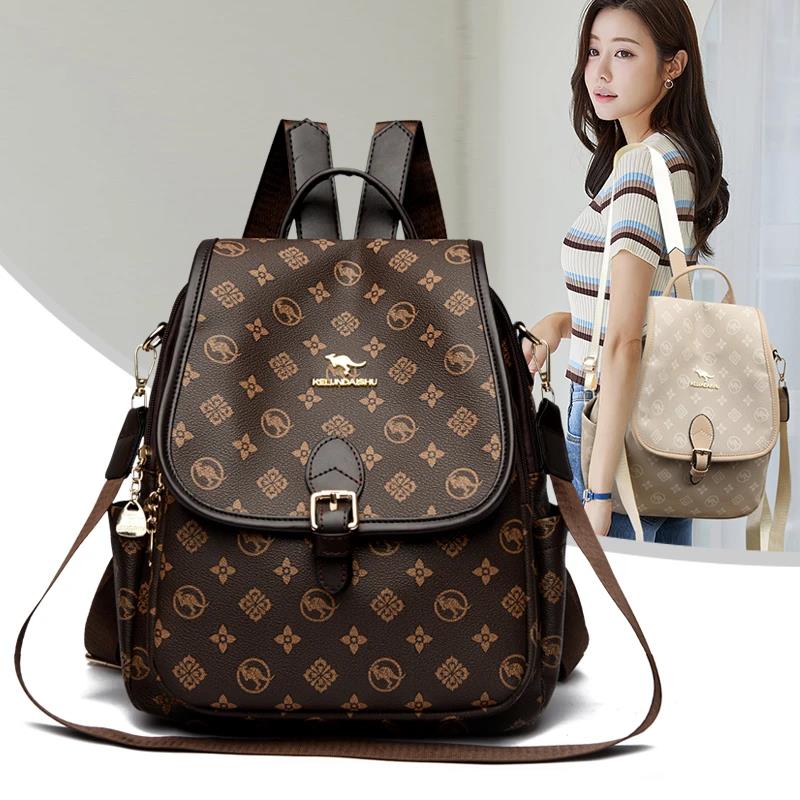 撞色软皮大容量双肩包中年背包2025新款潮流轻奢外出旅行时尚背包