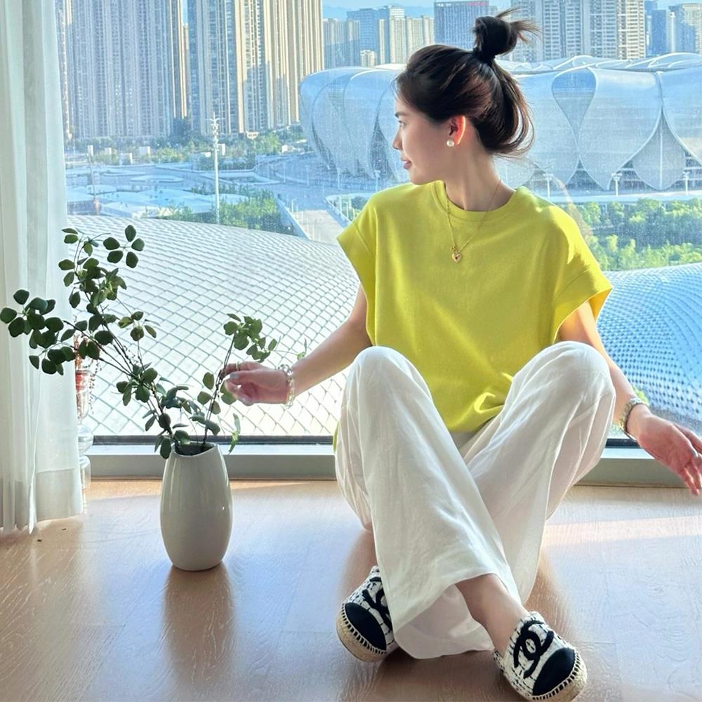 青柠绿色圆领宽松短袖TT恤女新款夏季多巴胺穿搭温柔减龄上衣