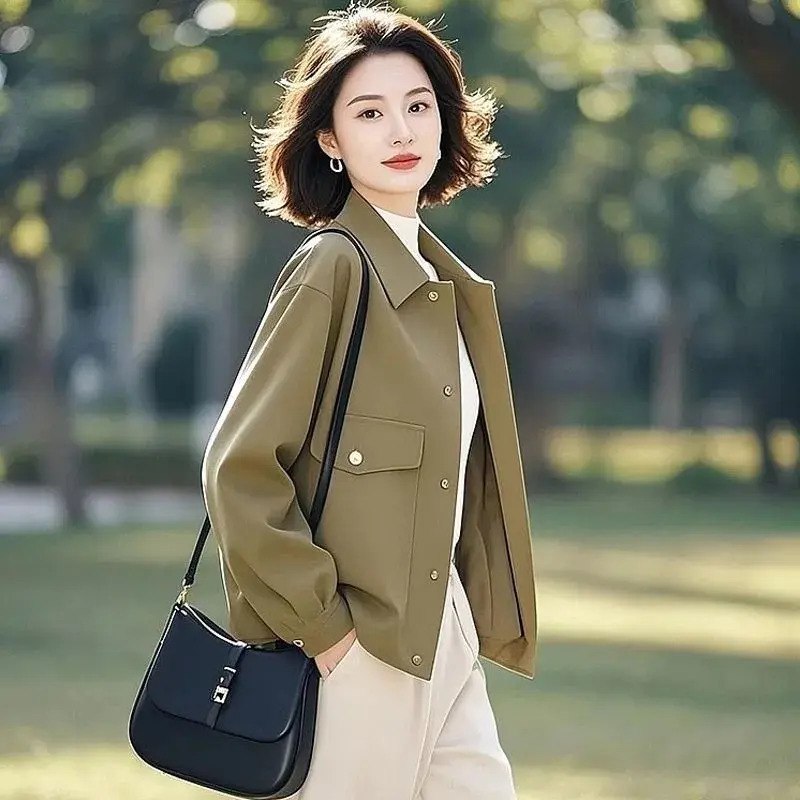 今年流行的新款独特绝美高级小众不撞款绿色外套女2026年新款春秋