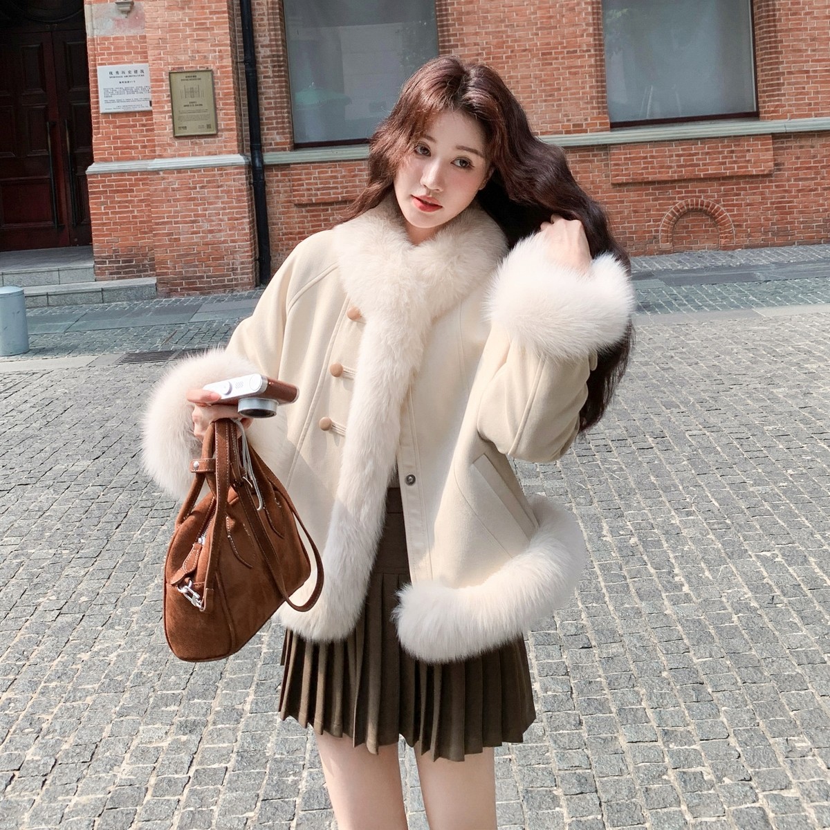 贵气感千金环保仿皮草拼接羽绒服女2025冬季气质皮毛一体保暖外套