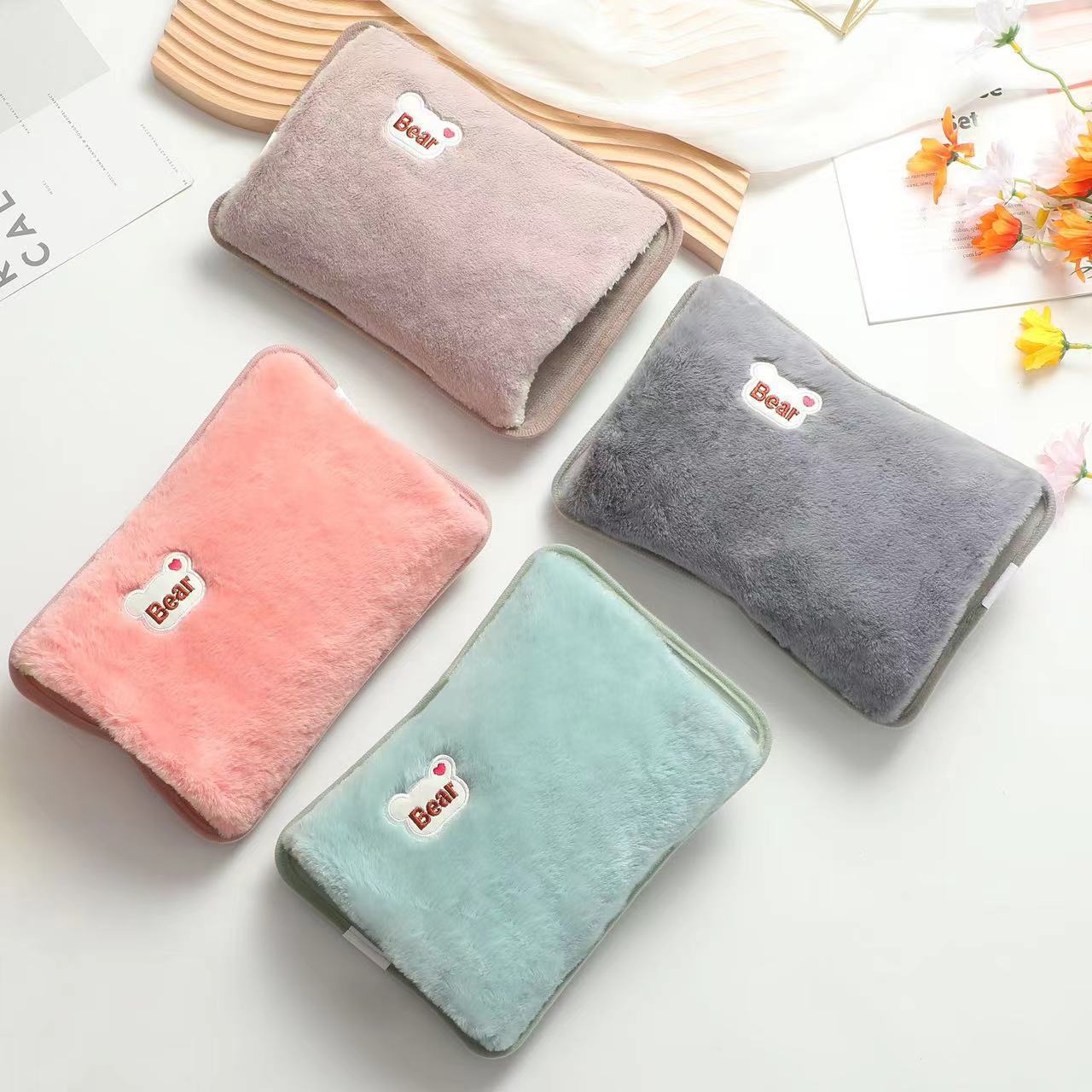 冬季新款充电式女生小熊头毛绒双插手暖手热敷可爱风电热水袋暖宝