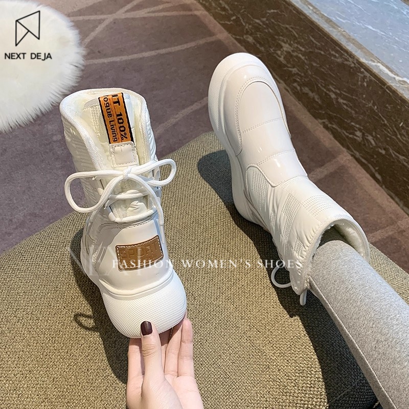 厚底东北雪地靴女中筒皮面防水保暖靴子女冬季棉鞋女百搭面包鞋子