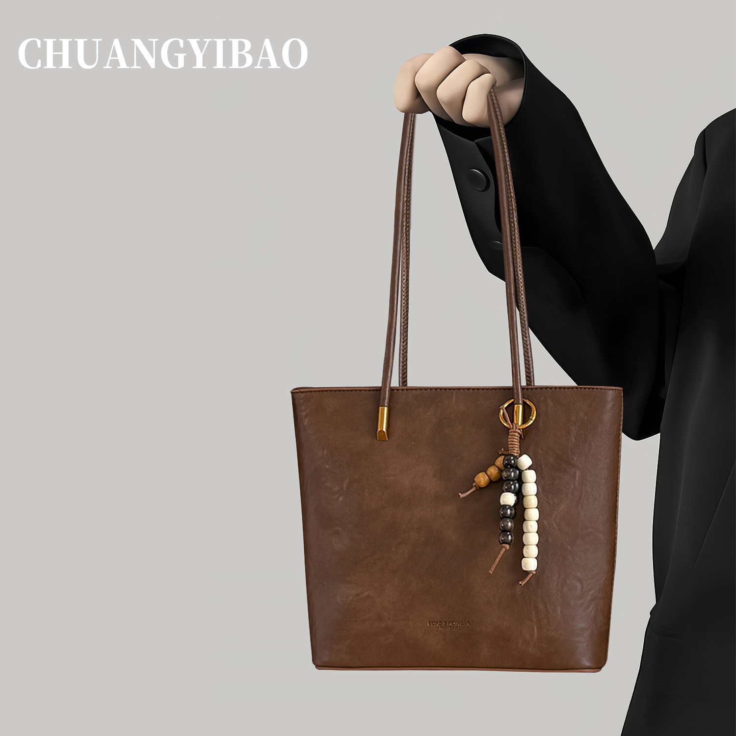 大容量手提托特包包女2025新款秋冬轻奢小众高级感百搭通勤水桶包