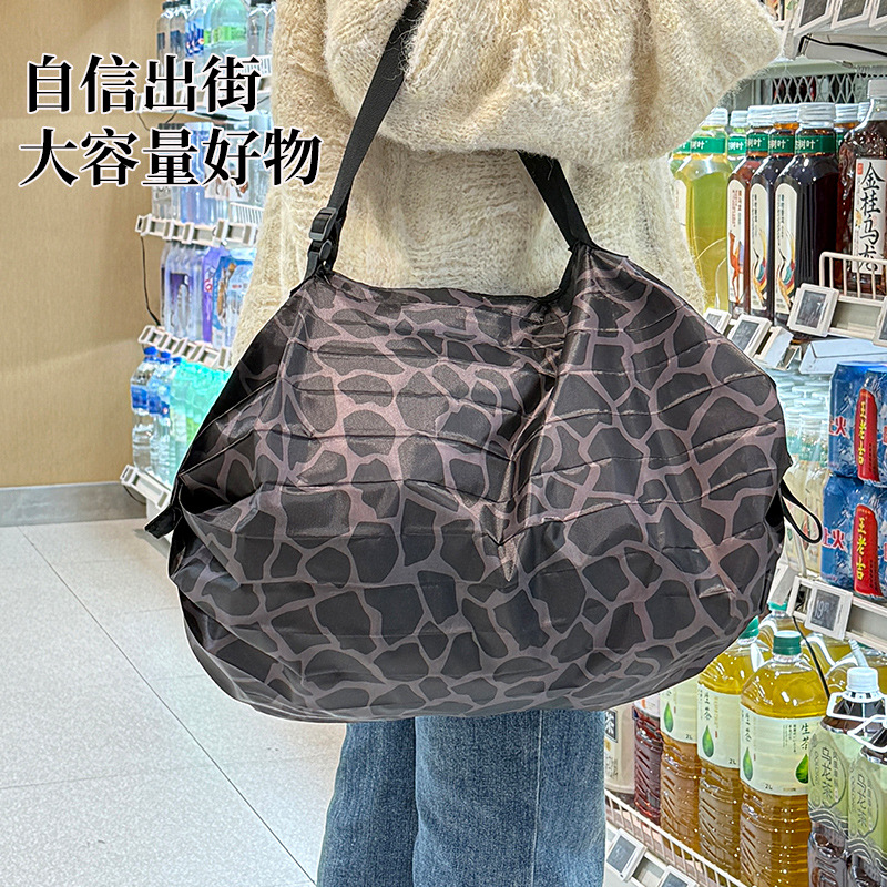 新款牛津布手提折叠旅行包便携环保行李收纳袋加厚布艺折叠防水袋