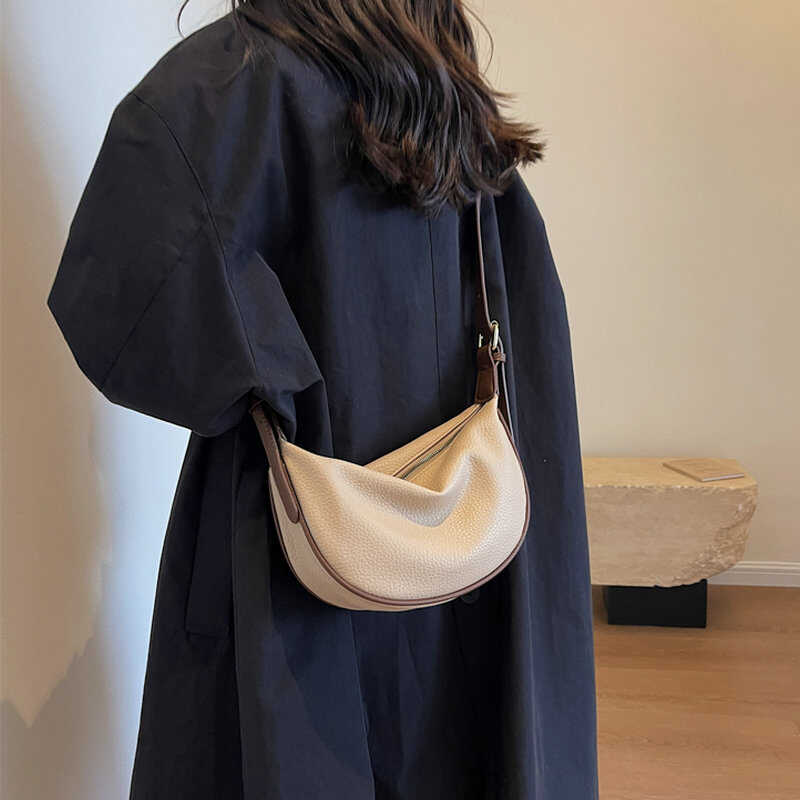 2025新款春高级感软皮半月包通勤大容量月牙包斜挎HOBO饺子包包女