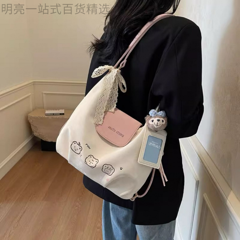 新疆西藏包邮2025新款可爱洋气小众单肩斜跨包休闲简约百搭双肩包
