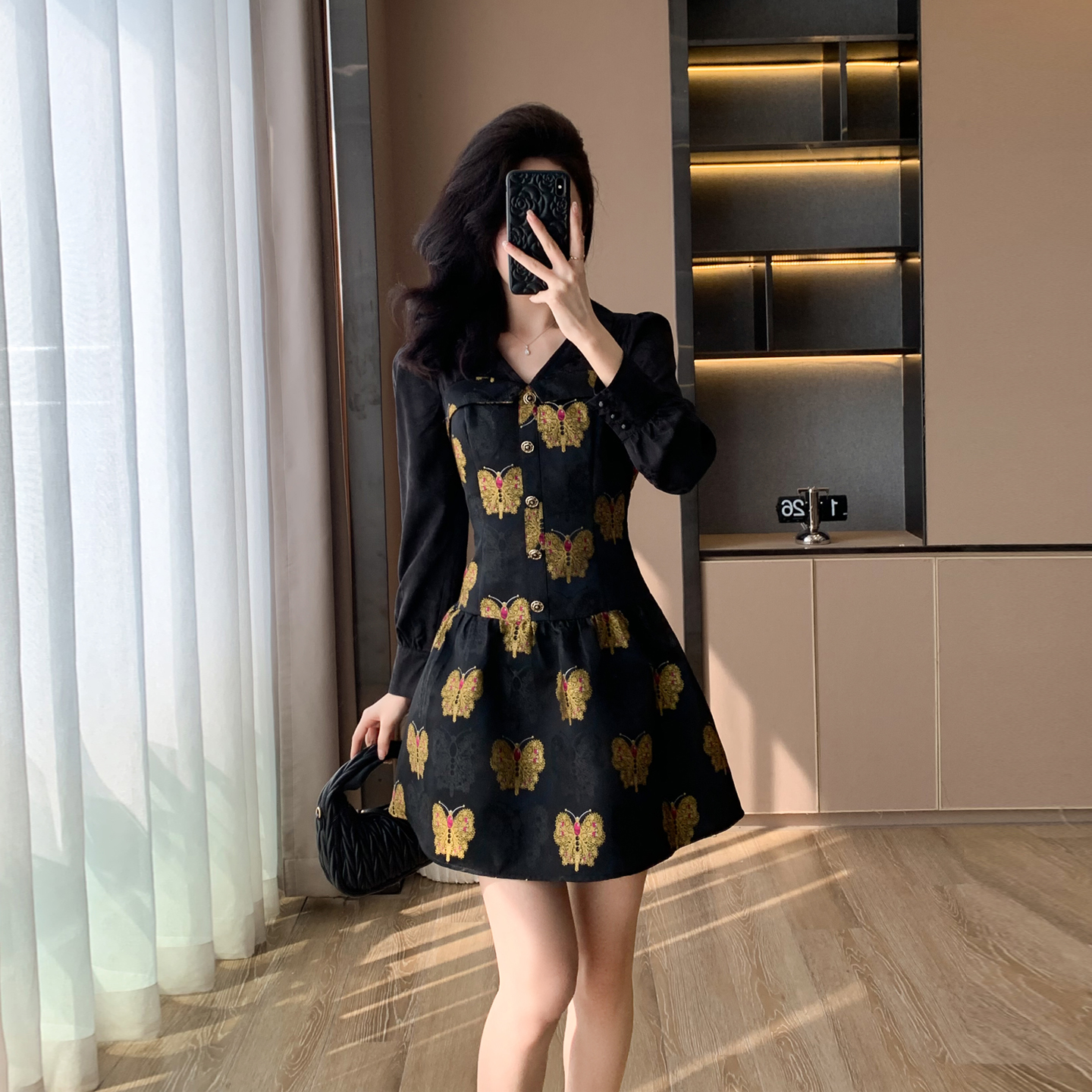 黑色显瘦中国风连衣裙女2025秋冬新款法式提花设计感收腰A字裙子