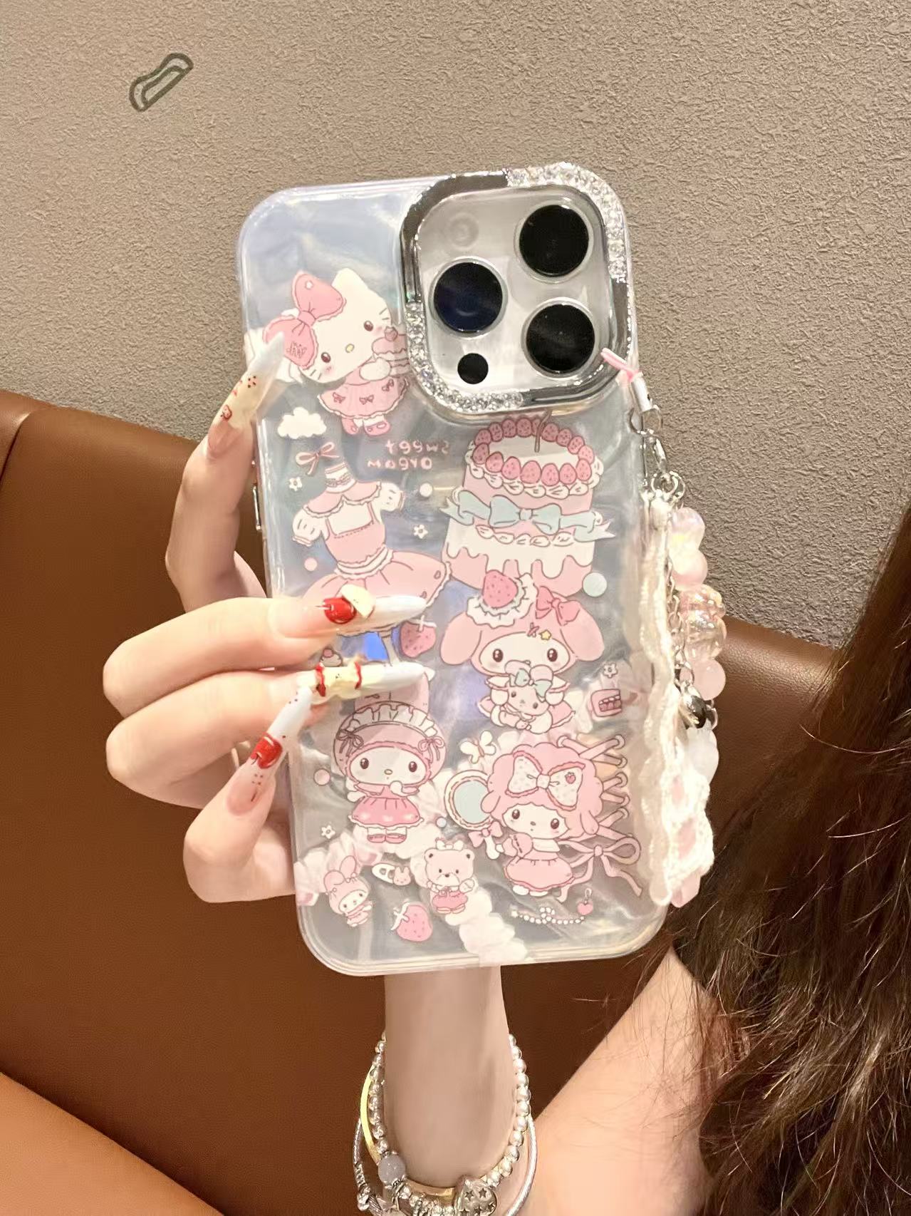 卡通可爱KT美乐蒂绸缎纹壳适用苹果16/15/14/13防摔手机壳