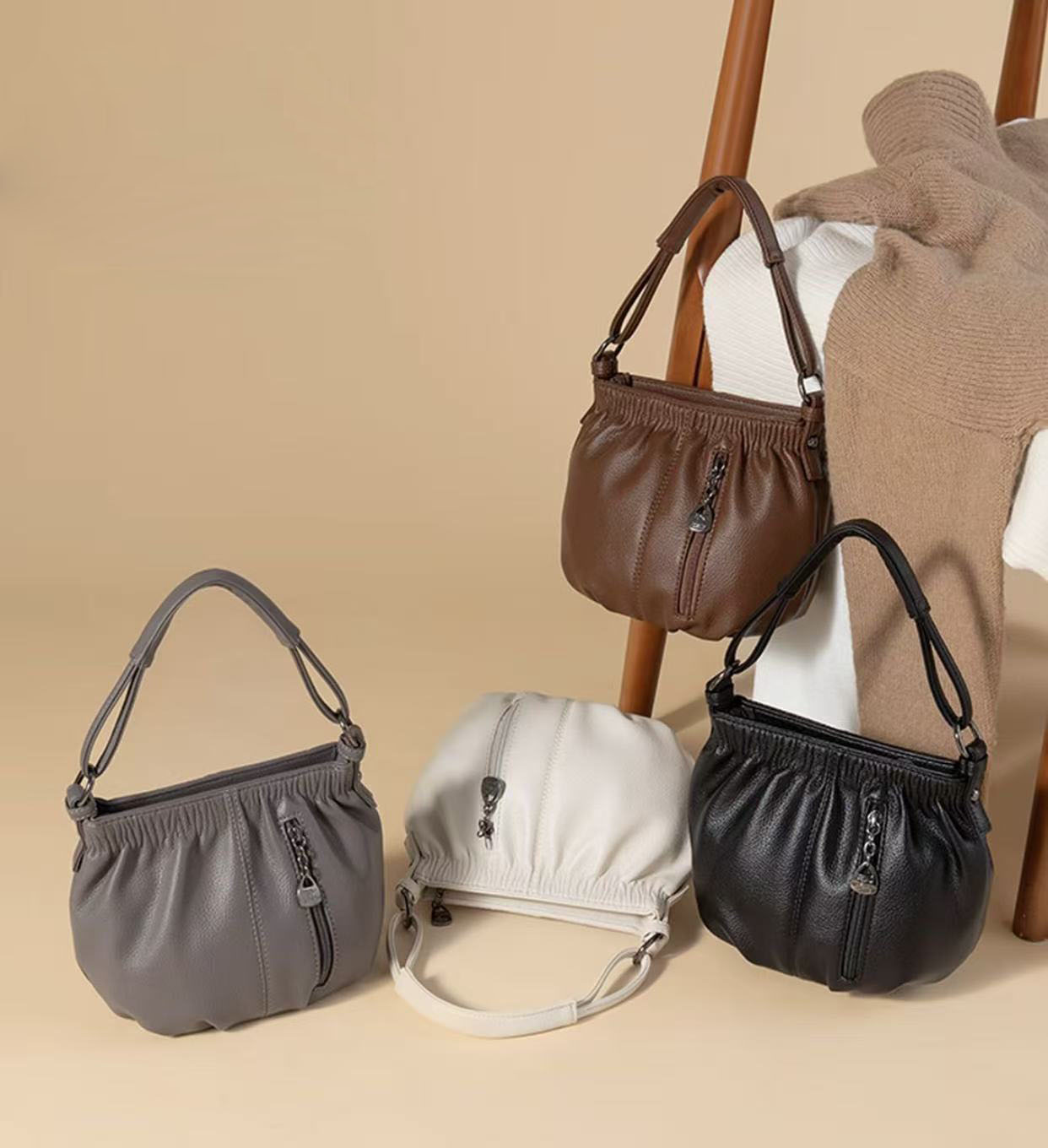 复古包包女2025新款竖款软面椭圆时尚中年斜跨小圆包休闲女士包包