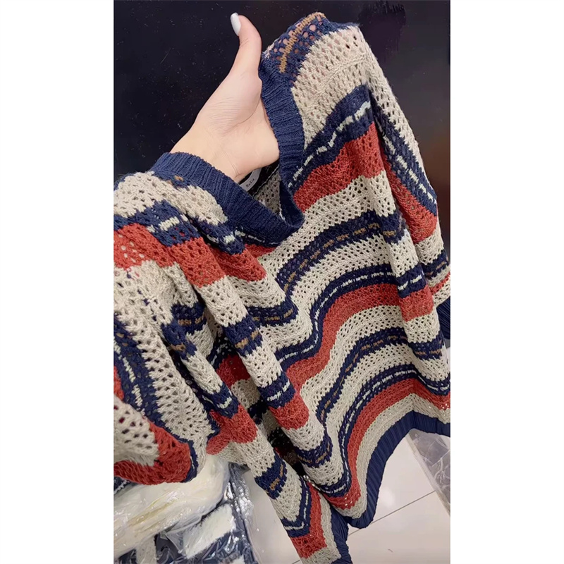 今年流行穿搭2025早秋新款温柔风镂空毛针织衫休闲欧若风长袖上衣