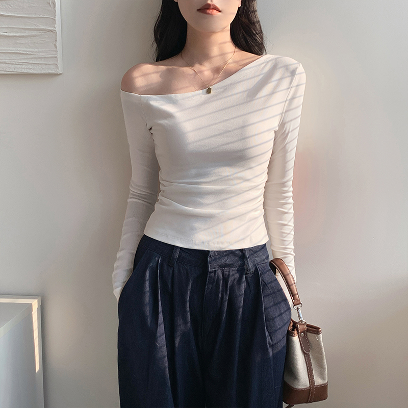 白色斜肩打底衫女内搭2026秋季新款修身辣妹性感露肩长袖t恤上衣