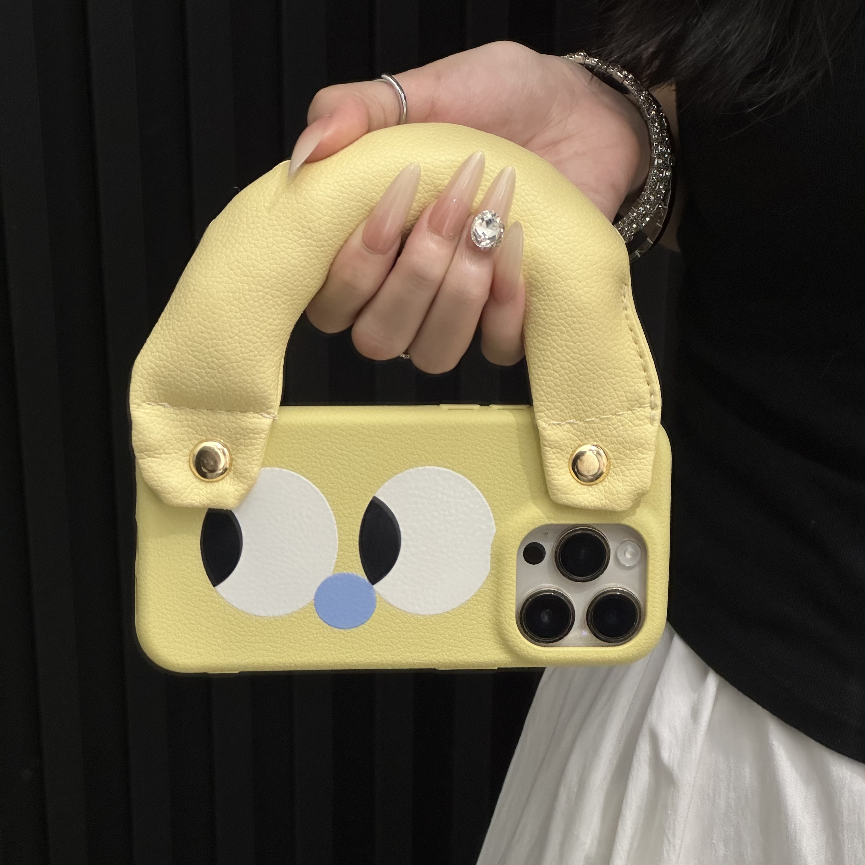 BANCAins大眼睛皮质充棉手腕适用苹果17promax皮纹华为P60手机壳