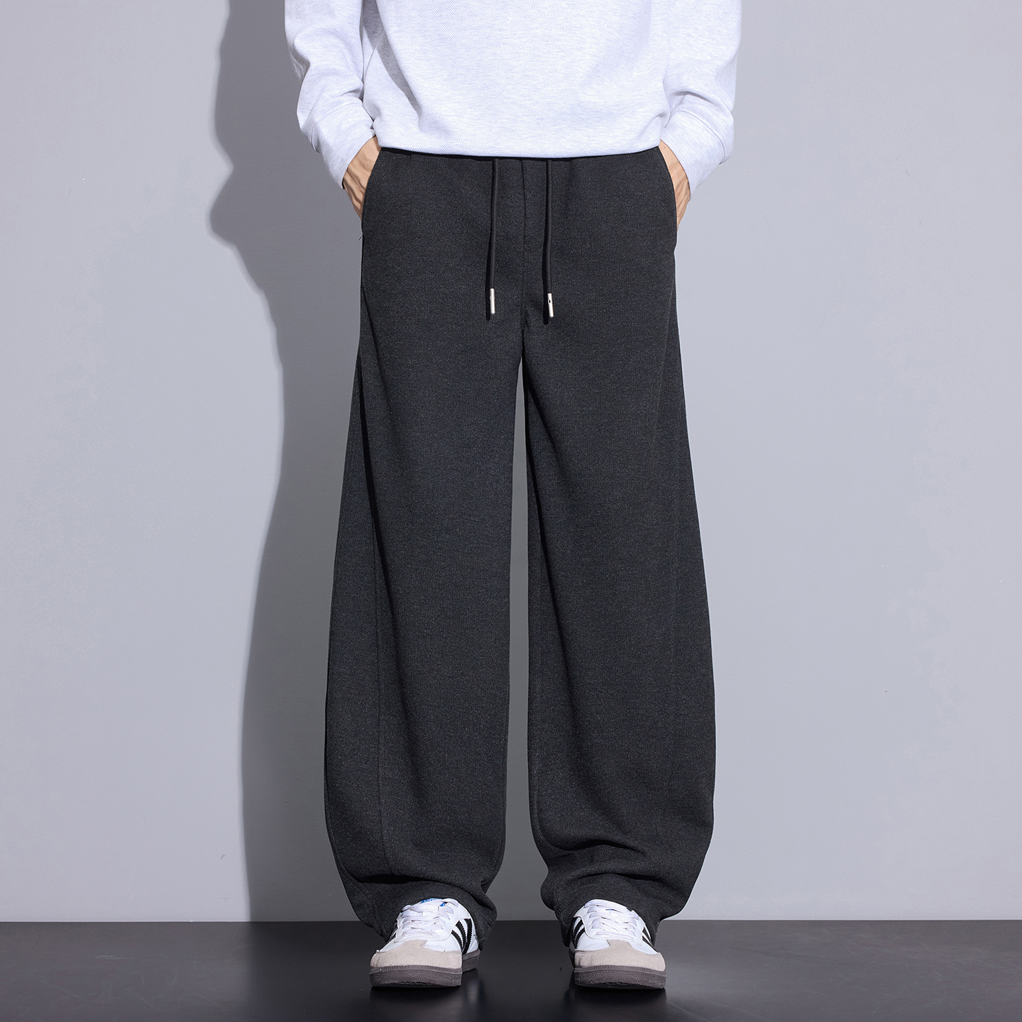 Kuvine2025冬季高级感羊毛加绒保暖休闲裤宽松小弯刀百搭男士裤子