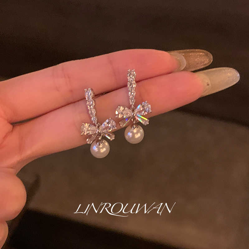 铜合金仿珍珠耳饰 蝴蝶结珠珠耳环2025新款小众设计轻奢百搭耳饰