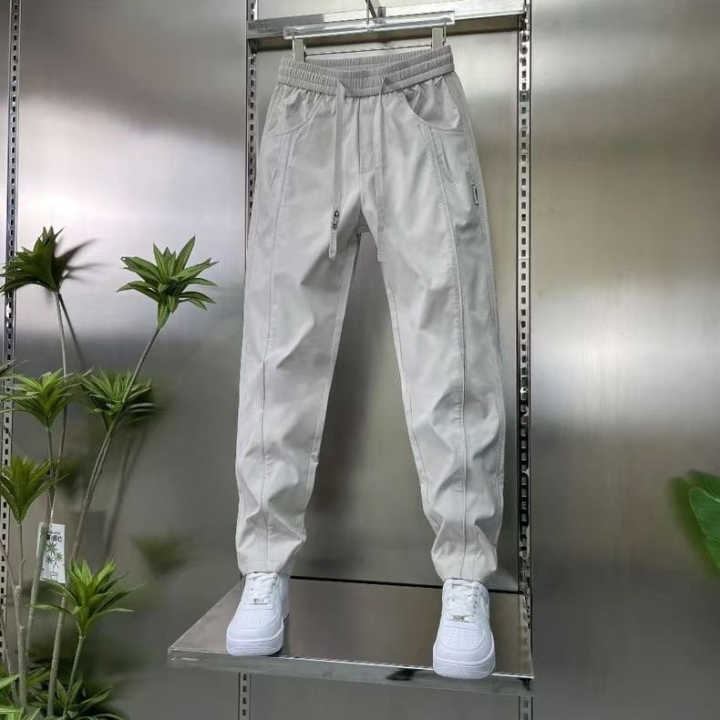 男士新款休闲裤潮流时尚百搭工装裤舒适显瘦纯色拼接宽松哈伦裤