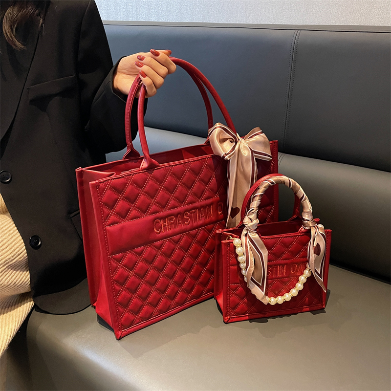 YUSMYU红色大容量包包女2025新款结婚新娘包质感手提单肩斜挎婚包