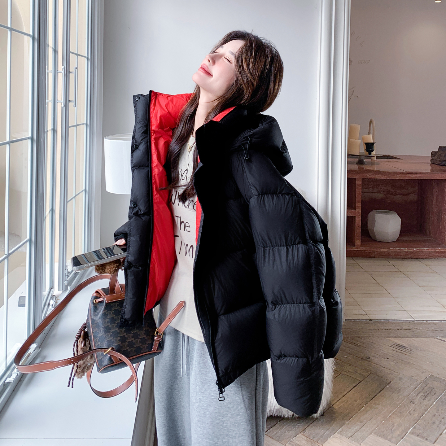 黑色宽松百搭慵懒风连帽泡芙羽绒服女2025冬季新款90绒保暖面包服