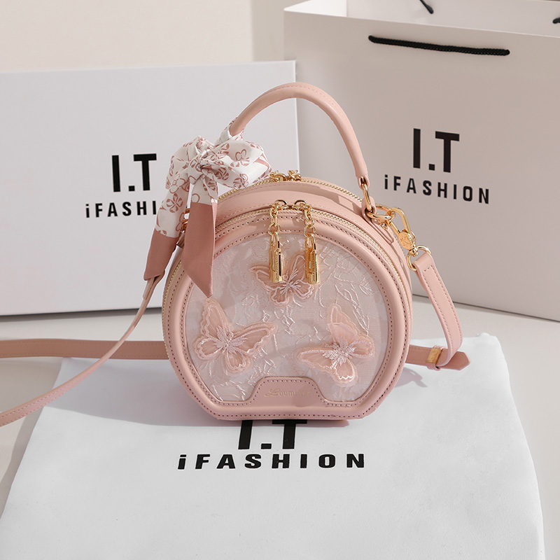 香港轻奢新中式刺绣小圆包女2025新款洋气小众手提斜挎圆饼包女