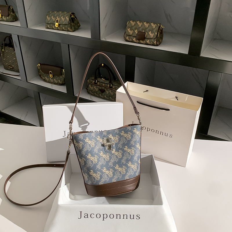 【雅各邦】女包2025新款百搭季腋下水桶通勤雅丹感手提单肩斜挎包包