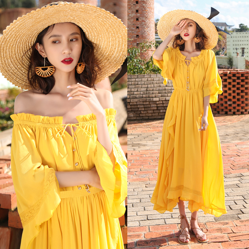 2025黄色一字肩显瘦高端海边度假连衣裙女波西米亚长裙沙滩裙超仙