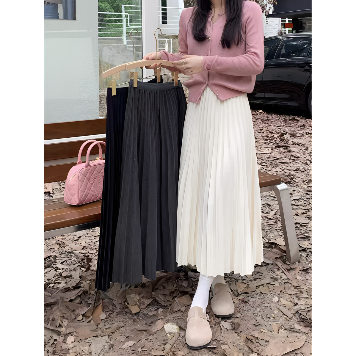 高级感杏色温柔毛呢百褶半身裙女2025秋冬新款显瘦大摆裙休闲伞裙