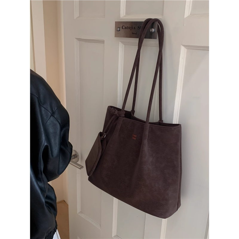 简约休闲大容量托特包包女式2025新款高级感日常通勤百搭单肩大包