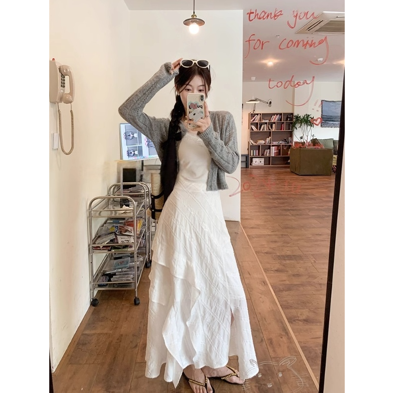 白色不规则荷叶边侧开叉半身裙女新款高腰显瘦气质百搭长裙子