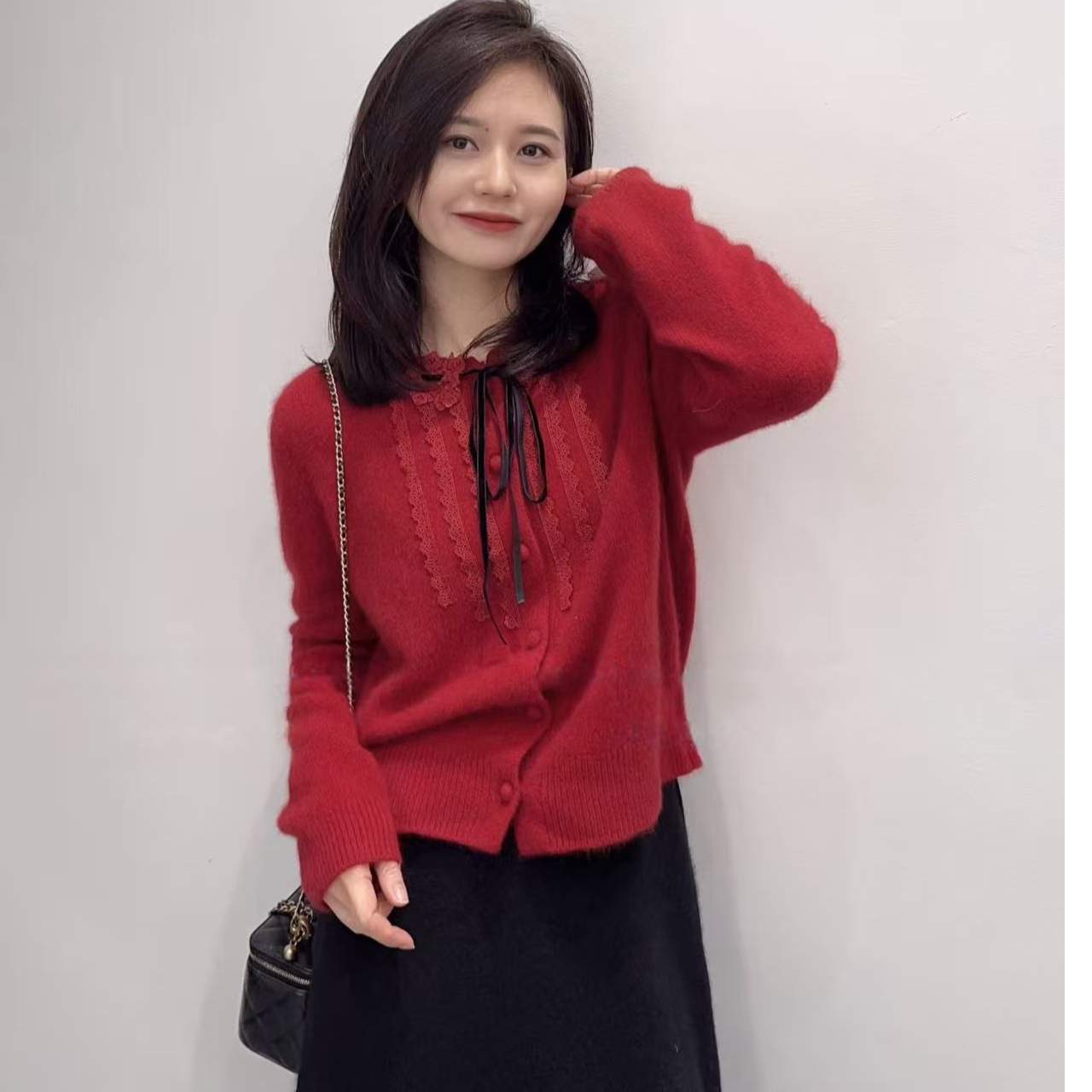 2026秋冬新款圣诞甜美风蕾丝拼接系带红色毛衣高腰半身裙两件套