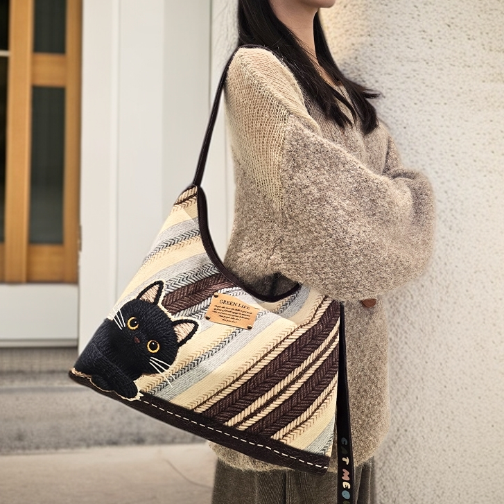 艺术鸭原创斜纹毛线黑煤球百搭休闲新月单肩斜跨包大容量通勤女包