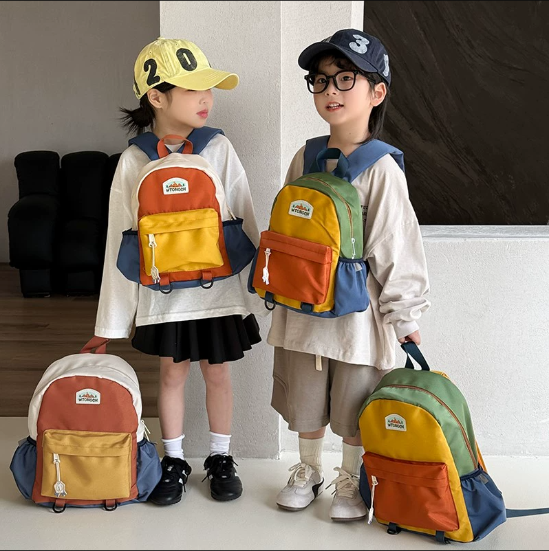 幼儿园儿童书包2025新款女童宝宝双肩包男孩小学生轻便撞色背包潮