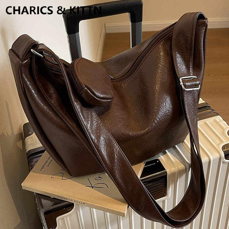 CHARICS&KITTN斜挎包包女款腋下女式2025新款通勤饺子真皮单肩包