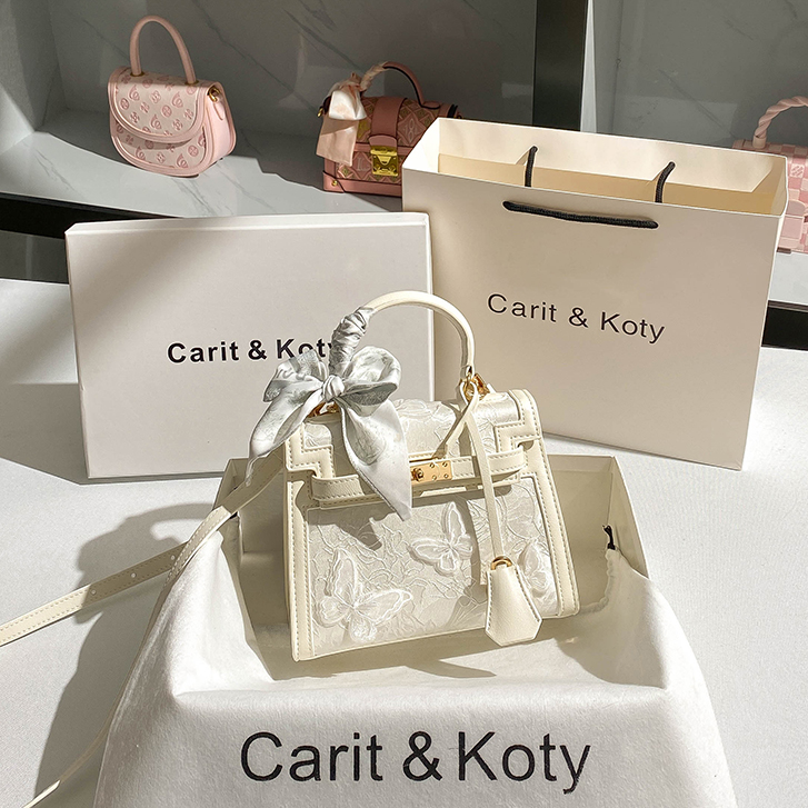 Carit Koty小众蕾丝手提包包女2025新款新中式蝴蝶通勤凯莉包斜挎